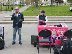 Jimmy Hassan speaking at a community event